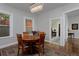 Charming dining room with windows and hardwood floors at 482 S Logan St, Denver, CO 80209