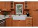 Beautiful kitchen with white countertops and wood cabinets at 482 S Logan St, Denver, CO 80209