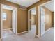 Hallway featuring multiple doorways at 5572 Kalispell St, Denver, CO 80239
