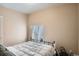 Cozy bedroom with natural light from the window and comfortable sleeping arrangements at 2838 Decatur St, Denver, CO 80211