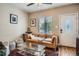 Comfortable living room with a neutral color scheme, hardwood floors, and a cozy atmosphere at 2838 Decatur St, Denver, CO 80211