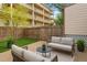 Comfortable outdoor seating on patio with privacy fence and green space, perfect for relaxing and entertaining at 2838 Decatur St, Denver, CO 80211