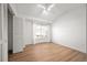 Bedroom with natural light, ceiling fan, wood floors, and closet at 2032 Oxford Ln, Superior, CO 80027