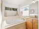 Bathroom with soaking tub and double vanity at 3026 W 111Th Dr, Westminster, CO 80031