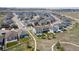A wider aerial view shows the surrounding neighborhood and nearby amenities at 6307 Saddle Bow Ave, Parker, CO 80134