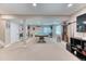 Finished basement game room with pool table, carpet, recessed lights and neutral walls at 6307 Saddle Bow Ave, Parker, CO 80134