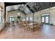 Community clubhouse with dining tables, a fireplace, and televisions at 6307 Saddle Bow Ave, Parker, CO 80134