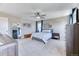 Inviting main bedroom featuring modern furnishings, soft carpet, ample natural light, and great closet space at 6307 Saddle Bow Ave, Parker, CO 80134