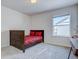 Cozy bedroom with double bed and a large window at 1397 Hart Ln, Elizabeth, CO 80107