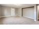 Spacious living room with neutral walls, carpet, and bright natural light at 530 Hickory St, Hudson, CO 80642