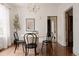 Elegant dining room with modern chandelier, hardwood floors, and chic decor at 461 S Sherman St, Denver, CO 80209