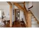 Welcoming foyer with hardwood floors, elegant staircase, and traditional trim at 461 S Sherman St, Denver, CO 80209