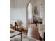 A bright living room with hardwood floors, an archway, and modern furniture at 461 S Sherman St, Denver, CO 80209