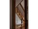 Classic wooden staircase design with a vintage umbrella stand at 461 S Sherman St, Denver, CO 80209
