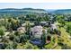 Majestic home with mountain views and lush landscaping at 16134 Sandstone Dr, Morrison, CO 80465