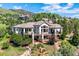 Expansive home boasts multiple balconies to enjoy mountain views at 16134 Sandstone Dr, Morrison, CO 80465