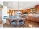 Gourmet kitchen features a large island with seating for three at 16134 Sandstone Dr, Morrison, CO 80465