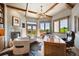 Bright home office with fireplace and access to a private balcony at 16134 Sandstone Dr, Morrison, CO 80465