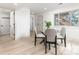 Cozy dining room featuring a glass table, and neutral decor with lots of natural light at 5814 Cole Way, Arvada, CO 80004