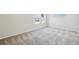Spacious bedroom with plush carpet and abundant natural light at 8785 Whiteclover St, Littleton, CO 80125