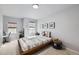 Bedroom with neutral walls, natural light, and simple decor at 5072 Cathay St, Denver, CO 80249