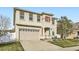 Charming two-story home with a two-car garage and landscaped front yard at 5072 Cathay St, Denver, CO 80249