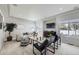 Cozy living room with plenty of natural light and comfortable seating area at 5072 Cathay St, Denver, CO 80249