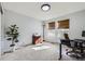 Office with lots of natural light, a desk, and a plant at 5072 Cathay St, Denver, CO 80249