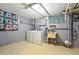 Basement laundry room with modern washer/dryer and utility sink, providing a functional space at 2232 S Ogden St, Denver, CO 80210