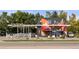 Birdcall restaurant exterior with outdoor dining area and colorful mural at 2232 S Ogden St, Denver, CO 80210
