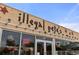 A restaurant front with large windows and signage under a sunny sky at 2232 S Ogden St, Denver, CO 80210