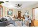 Inviting living room with hardwood floors, comfortable seating, and a ceiling fan at 2232 S Ogden St, Denver, CO 80210