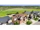 Aerial view of a residential neighborhood with well-maintained homes, landscaping, and green spaces at 3745 Spanish Oaks Trl, Castle Rock, CO 80108
