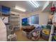 Finished basement offers storage, shelving, a small window, and room for storage at 9586 W Victoria Dr, Littleton, CO 80128