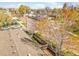 Aerial view of neighborhood with mature trees and rooftops at 4201 Shoshone St, Denver, CO 80211