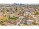 The aerial view captures the beautiful neighborhood and the Denver skyline in the background at 4201 Shoshone St, Denver, CO 80211