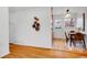 Dining room with hardwood flooring, bright walls, and space for entertaining at 4201 Shoshone St, Denver, CO 80211