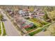 An aerial view of a residential area shows a single-level home with manicured lawns at 4201 Shoshone St, Denver, CO 80211