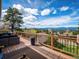 Outdoor deck with dining seating and mountain view at 24172 Jerome Ct, Golden, CO 80401