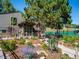 Beautifully landscaped home exterior with lush foliage and inviting front porch at 24172 Jerome Ct, Golden, CO 80401