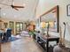 Open-concept living area features vaulted ceilings, tile floors, and natural light at 24172 Jerome Ct, Golden, CO 80401