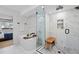 Stunning bathroom featuring a soaking tub, glass enclosed shower, and modern finishes at 2248 S Lincoln St, Denver, CO 80210