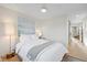 Light and airy bedroom with a comfortable bed and modern decor at 2248 S Lincoln St, Denver, CO 80210