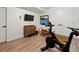 Home gym with peloton bike, rowing machine, and ample space for workouts at 2248 S Lincoln St, Denver, CO 80210