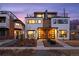 Modern two-story home with rooftop deck, eye-catching design, and professional landscaping at 2248 S Lincoln St, Denver, CO 80210