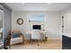Well-lit home office with desk, chair, and ample natural light at 2248 S Lincoln St, Denver, CO 80210