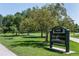 Lush green park with mature trees and walking path at 2248 S Lincoln St, Denver, CO 80210