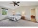 Spacious main bedroom features a vaulted ceiling, a ceiling fan and neutral decor at 3285 W 11Th Avenue Ct, Broomfield, CO 80020