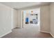 Neutral-colored room with carpeted flooring, white trim, and a walk-in closet at 3285 W 11Th Avenue Ct, Broomfield, CO 80020