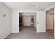 Bright room with large closet adjacent to a large open room with storage shelving at 3285 W 11Th Avenue Ct, Broomfield, CO 80020
